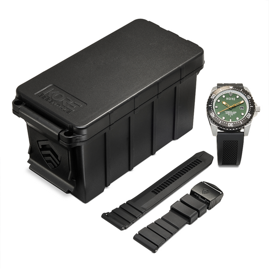 Overhead View of Kore Essentials Timberland Tactical Field Watch with Black Kore Essentials Ammo Case Box and a Spare Kore Essentials Micro-Adjustable Watch Band