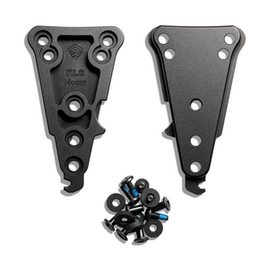 A pair of black aluminum KLS Mount brackets with a small pile of mounting hardware including screws, washers, and black washers, displayed on a clean white background.