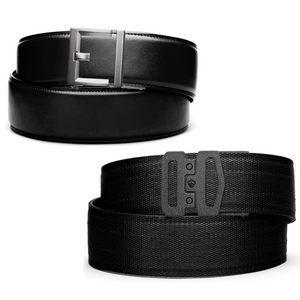 Two Kore Essentials Garrison Range Gun Belts - One Black Leather Garrison Range Gun Belt with a G2 Gunmetal Buckle and one Black Nylon Garrison Range Gun Belt with an G1 Buckle